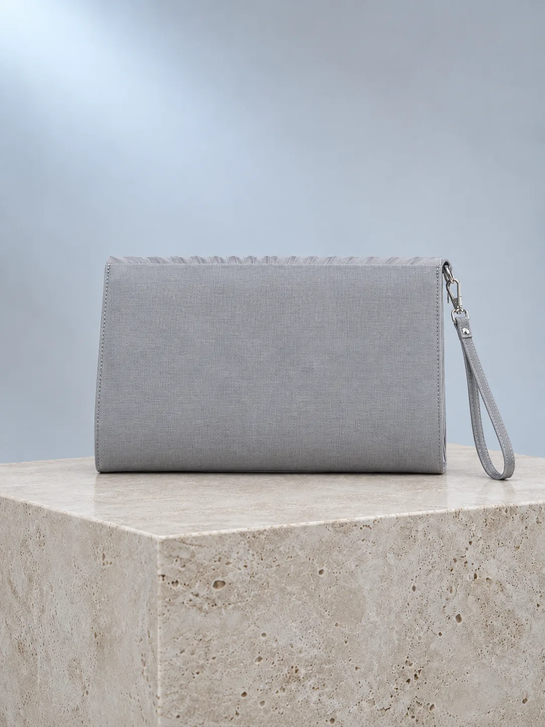 Fan Pleat Clutch in Moon Grey, back view