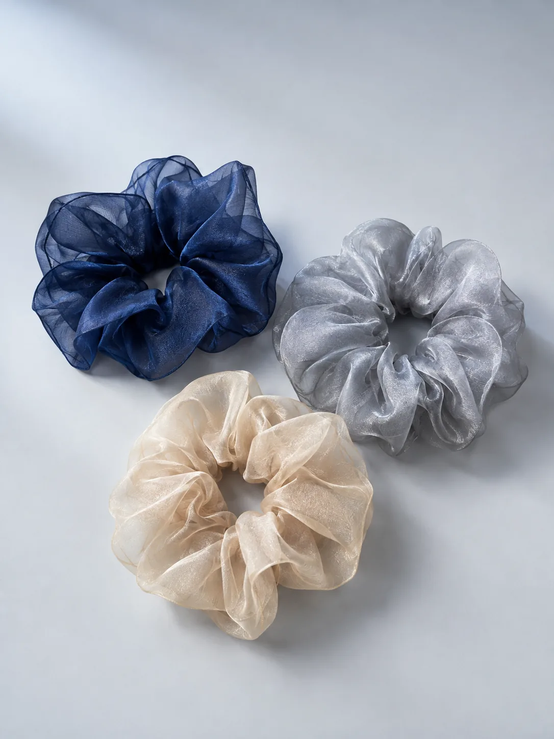 Organza Scrunchie Trio in Ink, Silver Mist, Champagne, front view